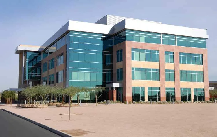 Modern Office Building With Reflective Glass Windows